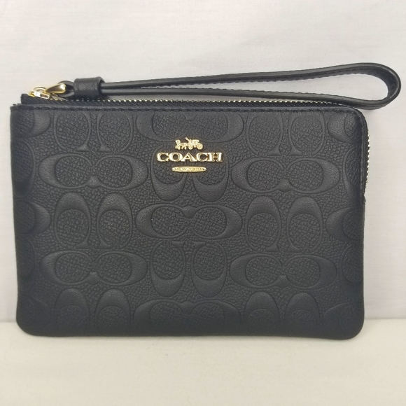 Coach Handbags - Coach Corner Zip Signature Embossed Wristlet